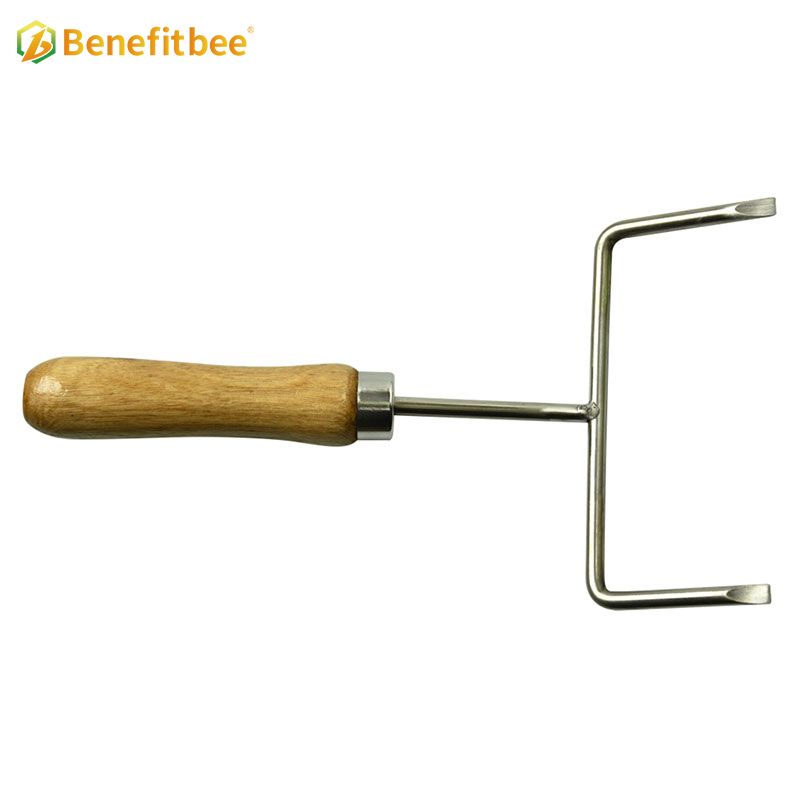 Beehive frame honey comb fork